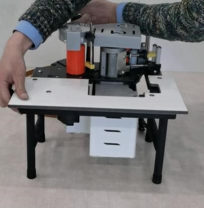 Portable roller-ball mini edge banding machine for seamless finishes